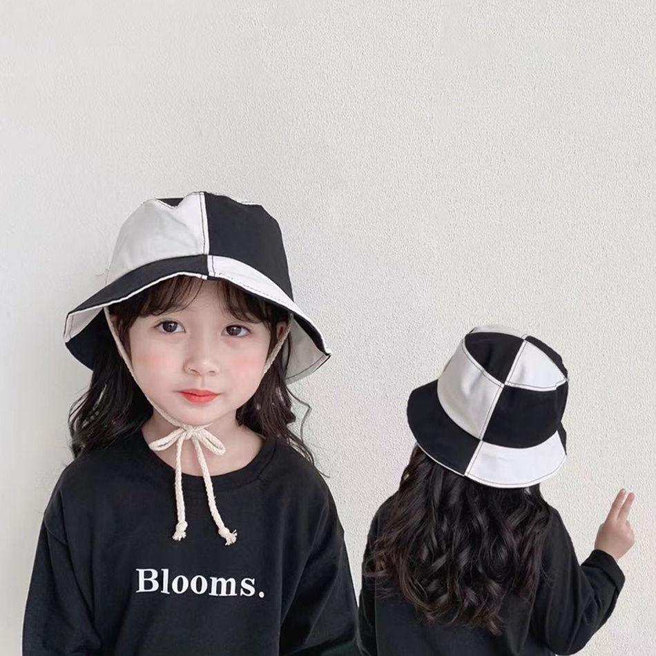 Nón vành tròn caro trắng đen cho bé trai bé gái