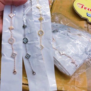 Lắc tay titan LV xà cừ