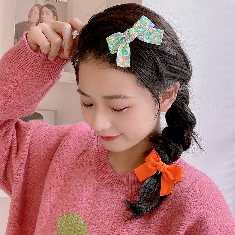 Kẹp tóc hình nơ ngọt ngào cho nữ