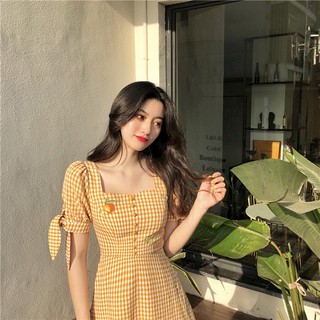 Đầm sọc ca rô vàng trái cam