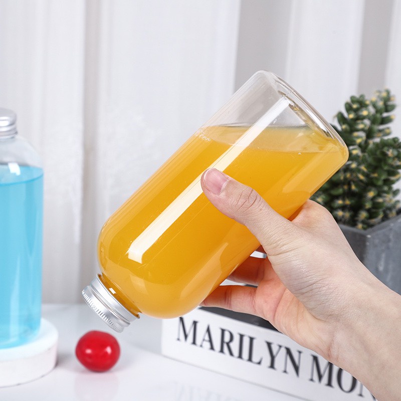 Chai thủy tinh/ Bình thủy tinh tròn cao kèm nắp thiếc dung tích 500ml