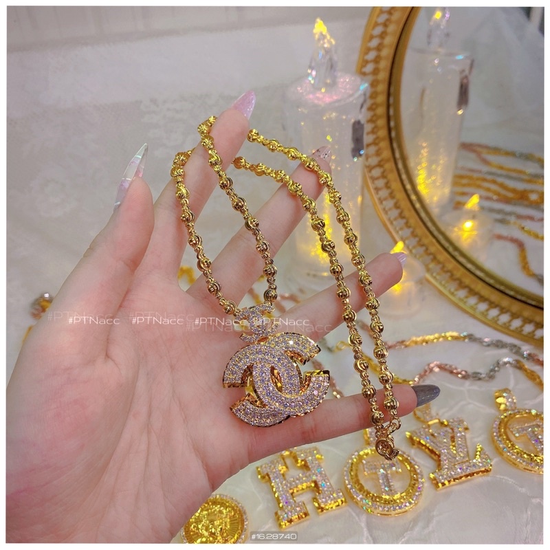 Mặt lẻ dây chuyền logo thương hiệu đính full soàn tấm xi bạch kim, xi mạ vàng .PTNACC.