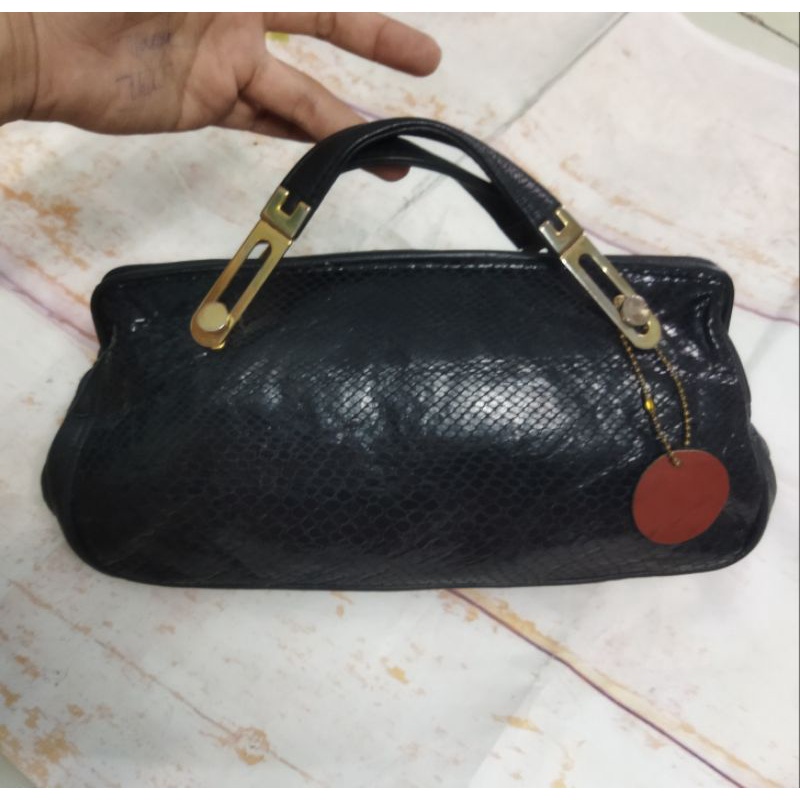 Túi si cluth cầm tay da thật