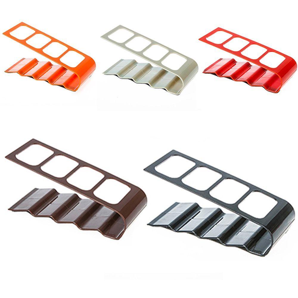 Giá Đỡ Điện Thoại Bằng Nhựa 4 Ngăn Tiện Dụng