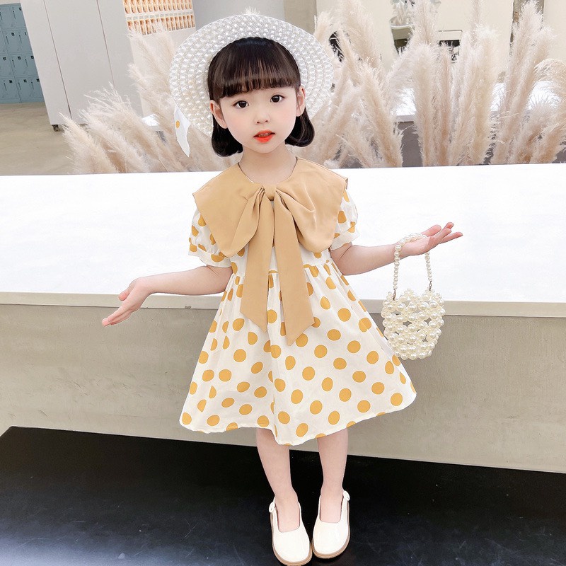 Váy bé gái chấm bi nơ cổ to 2 mầu xanh vàng XHN982