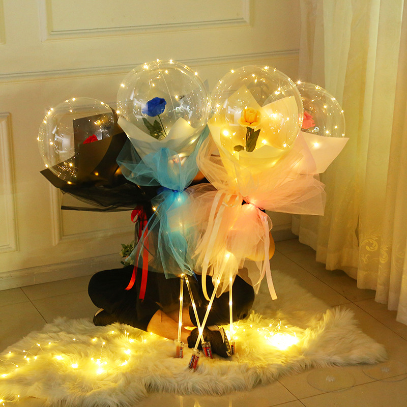 Bong bóng trong suốt có thể nhét hoa hồng hay đèn led dùng để trang trí tiệc