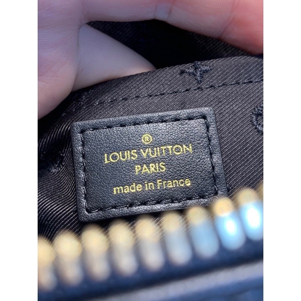 Túi lv hến cầm tay