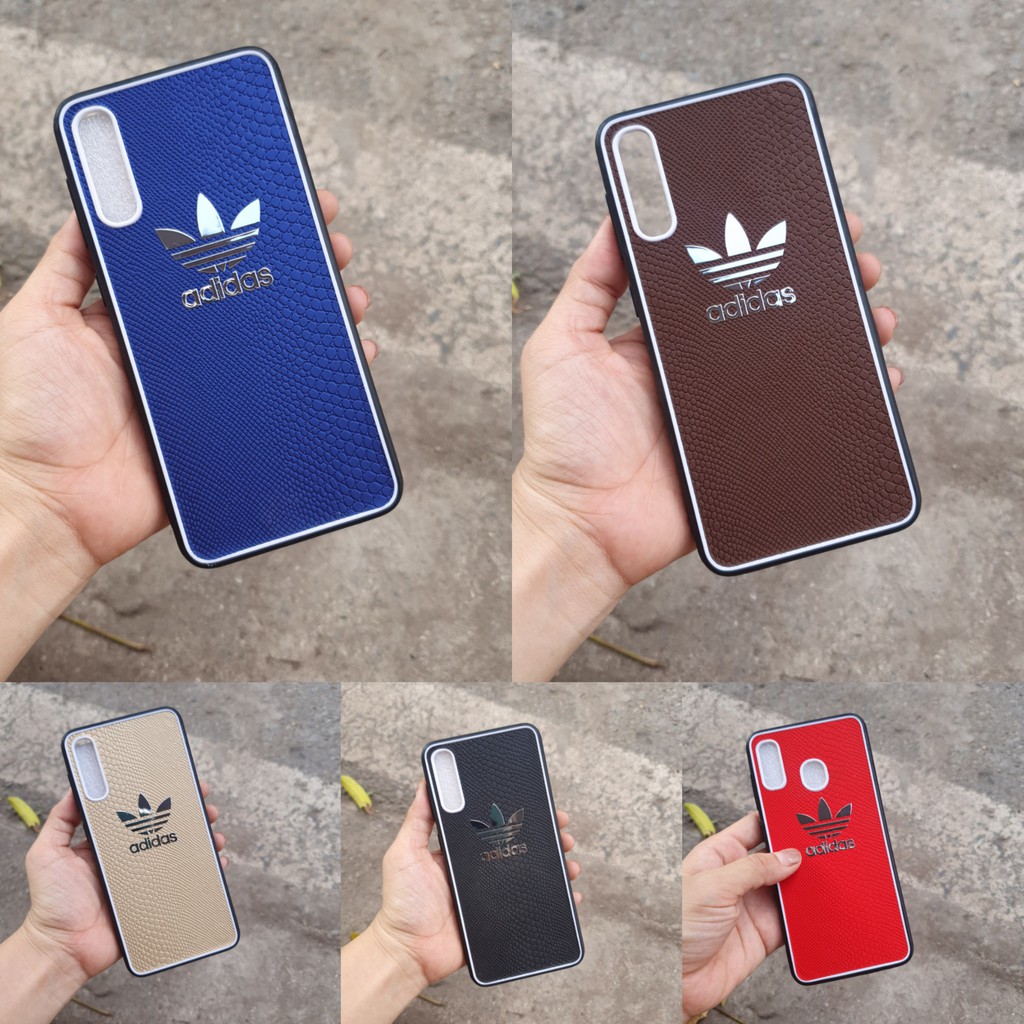 Ốp lưng cứng viền dẻo giả vân gắn logo hãng Samsung J7 Prime/ A30S/ A50/ A50S/ A20/ A30/ A7 (2018)