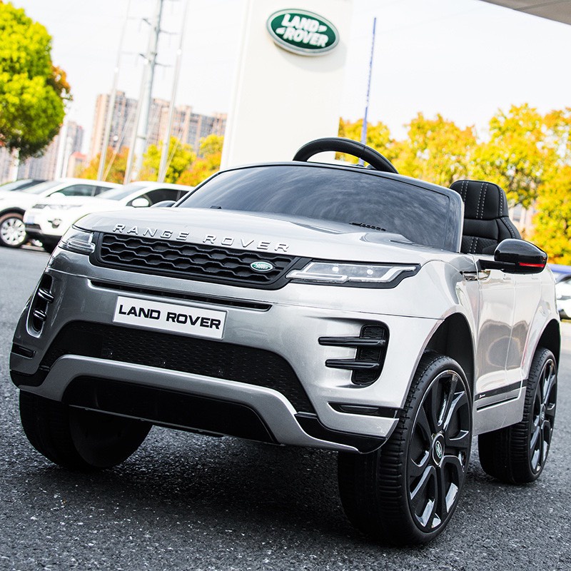 Ô tô xe điện trẻ em LAND ROVER tự lái và điều khiển xa bánh cao su, ghế da, sơn tĩnh điện bản quyền (Đỏ-Trắng-Đen)