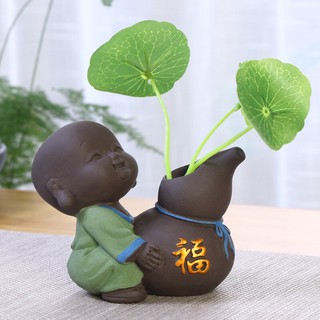 Tượng phong thủy chú tiểu trồng cây bê hồ lô Phúc Lộc Đầy Nhà