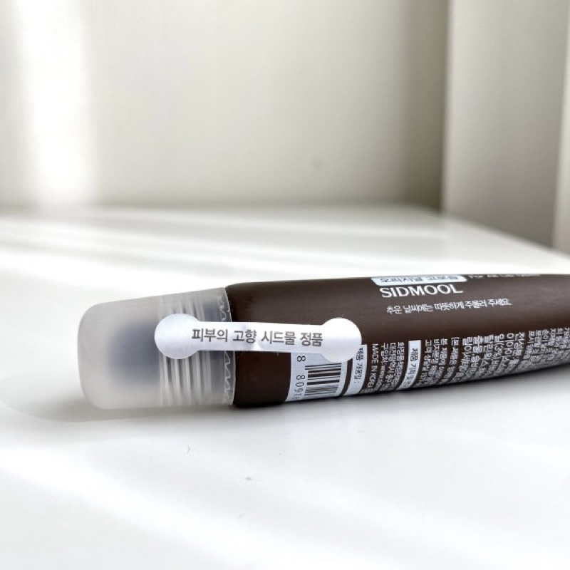 Date T04/25 Son dưỡng môi Sidmool Jojoba/Centella lip essence 13ml