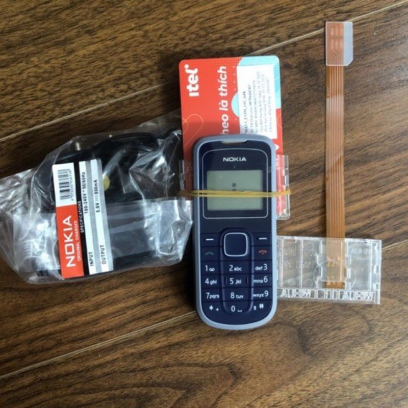 Điện thoại kích sim , máy 1202 + khay đọc sim + sạc