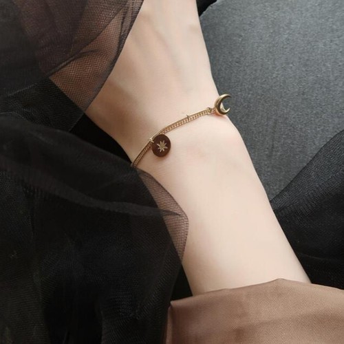 Lắc Tay Trăng Sao Titan Ko Đen TT 2972