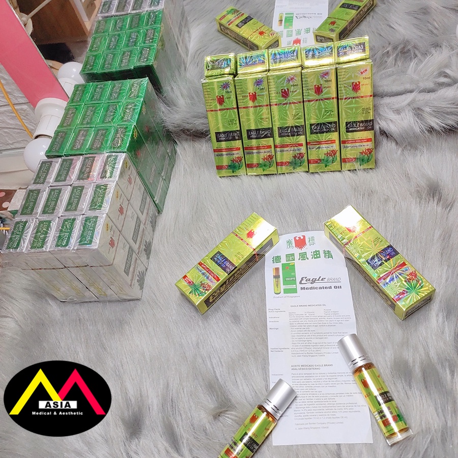 Dầu gió EAGLE Brand con ó lăn đau đầu chóng mặt say tàu xe massage singapore 10 12ml