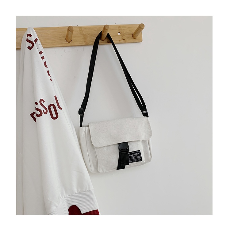 Túi xách nam nữ ulzzang vải đơn giản tiện lợi mini đựng đồ hai màu đen trắng T2M