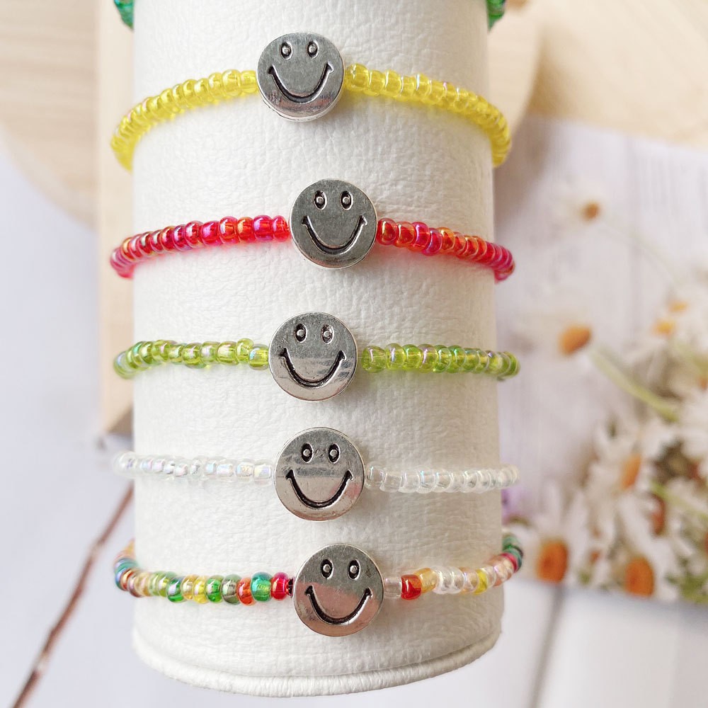Vòng tay/ vòng cổ chuỗi hạt nhiều màu sắc phối mặt hình hoa mặt cười dễ thương thời trang mùa hè