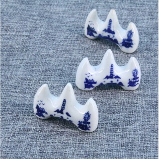 Gác cọ sứ / gác đũa sứ p1