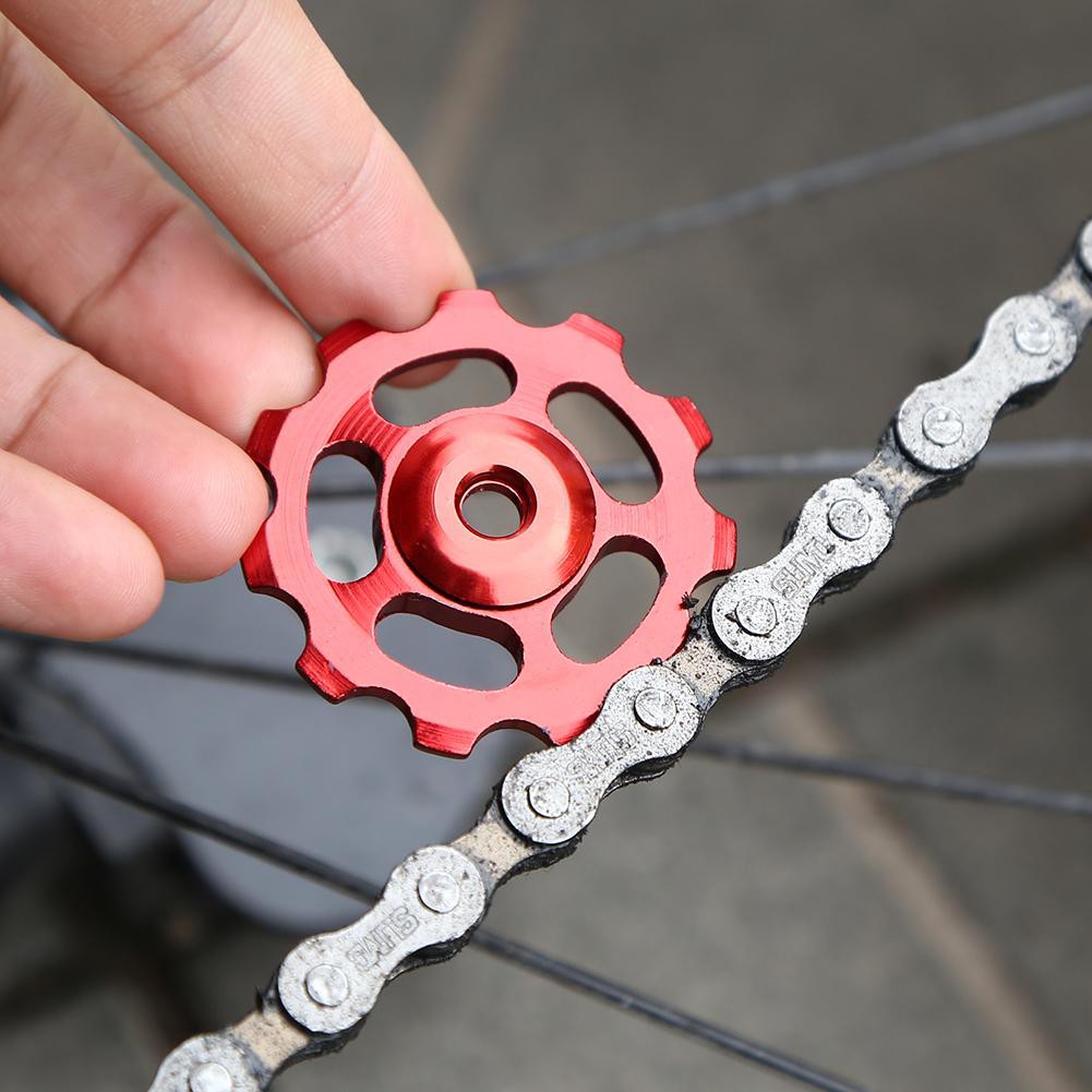 Con lăn trục CNC vòng bi ròng rọc bằng sứ gắn dẫn hướng phía sau bánh xe đạp leo núi MTB 11T