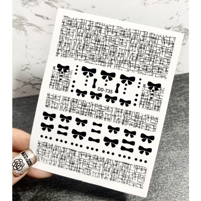 Hình dán sticker vải tweed