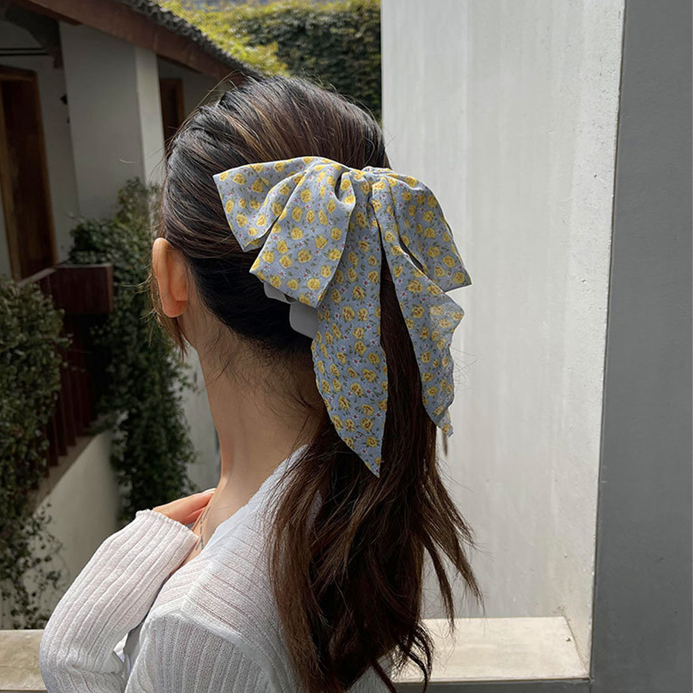 Kẹp tóc đính nơ dễ thương xinh xắn dành cho phái nữ