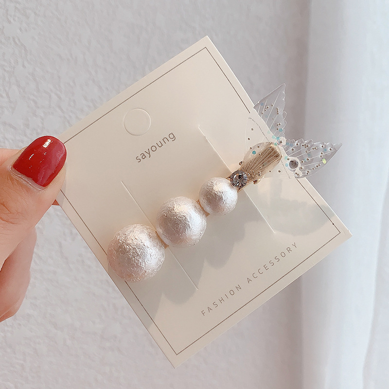 Kẹp tóc đính ngọc trai nhân tạo xinh xắn theo phong cách 2092610