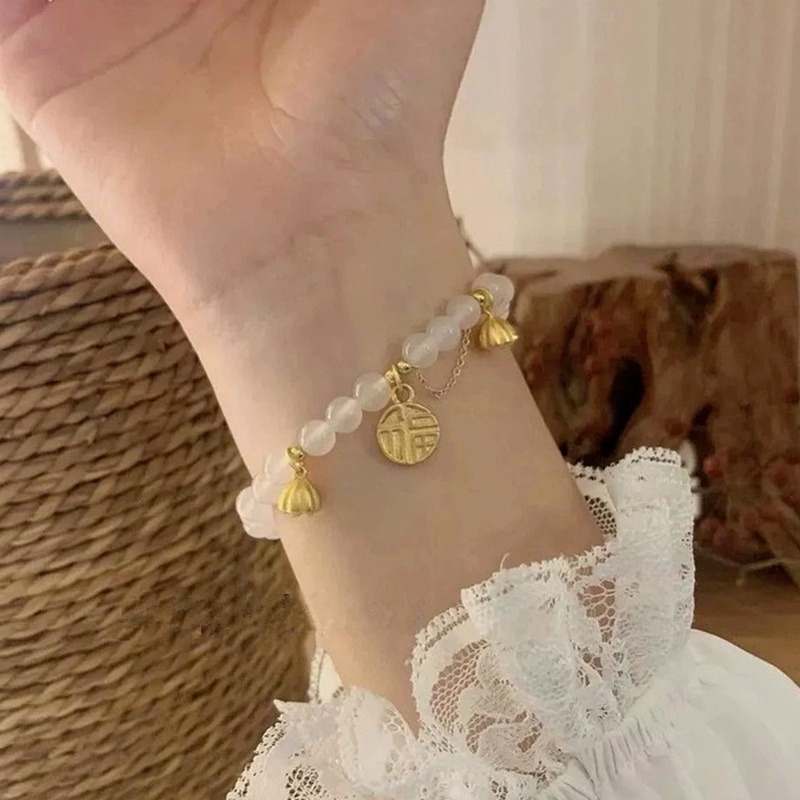 Vòng tay We Flower chuỗi hạt ngọc trai mặt hoa sen may mắn thời trang cho nữ