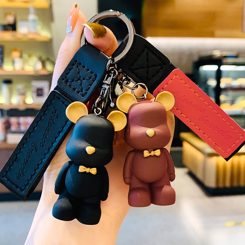 Móc chìa khoá túi xách gấu bearbrick dây cầm bằng da đáng yêu