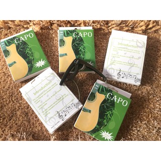 Capo đàn ukulele và guitar