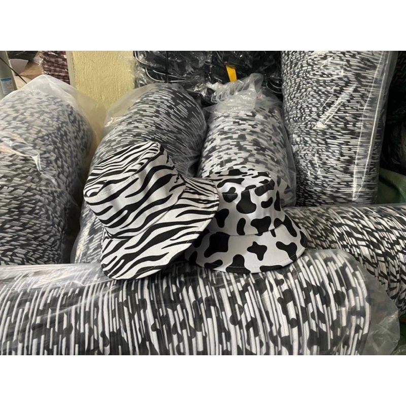 Rẻ giật mình xả mũ loang bò sữa và mũ vằn giá 9k