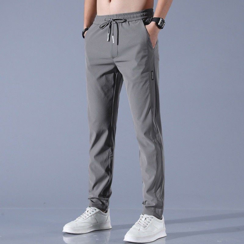Quần jogger thể thao vải lụa lạnh mỏng dáng rộng thời trang mùa hè cho nam giới