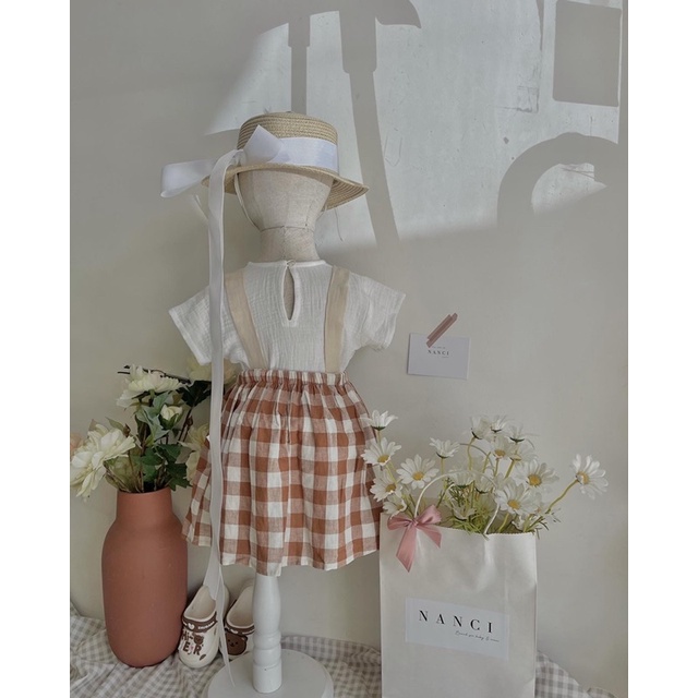 Váy + áo caro nâu bé gái Nanci room