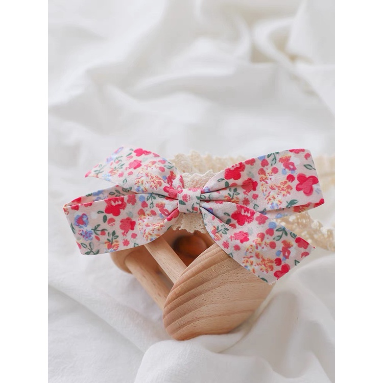Băng đô/turban ren đính nơ vải hoa văn vintage xinh xắn cho bé phong Hàn Quốc mềm mại, co giãn tốt