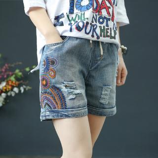 Quần short chất liệu jean lưng thun thêu họa tiết thời trang dành cho nữ
