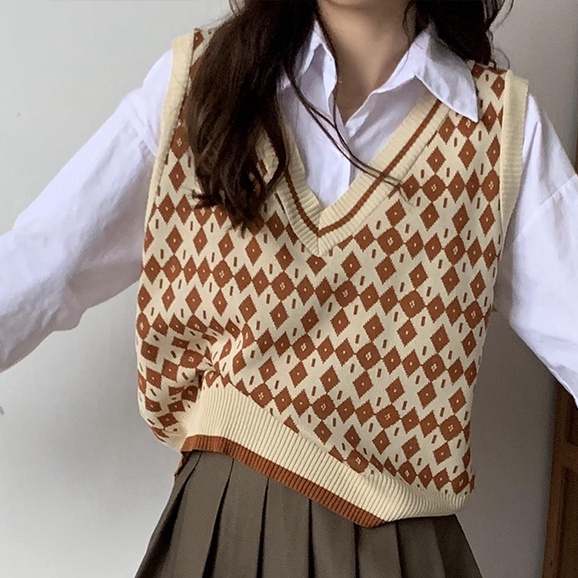 Áo Dệt Kim Sát Nách Cổ Chữ V Dễ Phối Đồ Thời Trang Cho Nữ