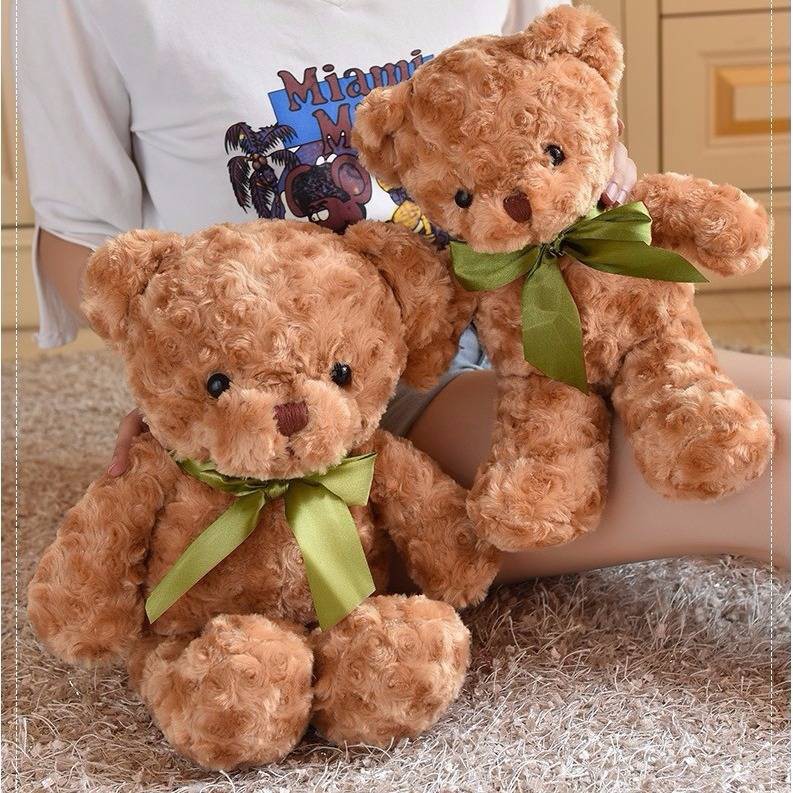 Gấu Teddy nhồi bông màu trắng thắt nơ đáng yêu