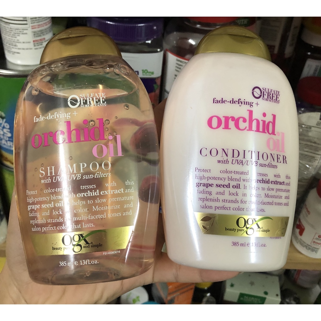 Dầu gội và dầu xả Ogx Fade-Defying Orchid Oil 385ml - Dành cho tóc màu