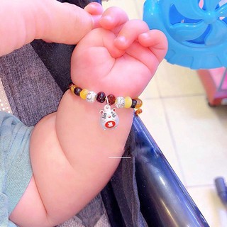 Vòng hổ phách mix con giáp bạc cho bé