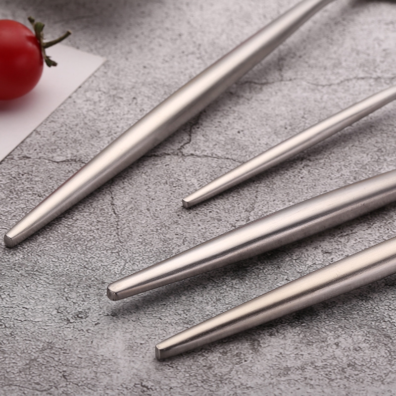 Western steak cutlery and Western style Portuguese silver knife and fork.