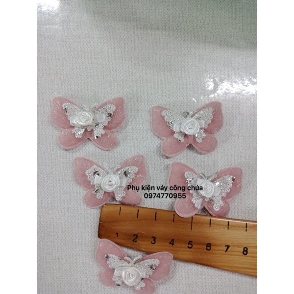 Bướm trang trí váy áo .