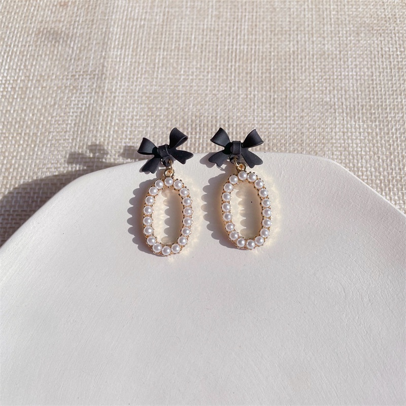 Khuyên tai kẹp không bấm lỗ chốt cố định K196 bằng hợp kim phủ màu hình elip đính nơ hạt trai dáng midi Leous