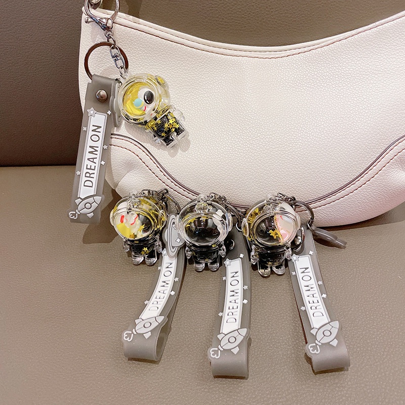 Hoạt Hình Móc Khóa Hình Chai Dầu Phi Hành Gia Nổi