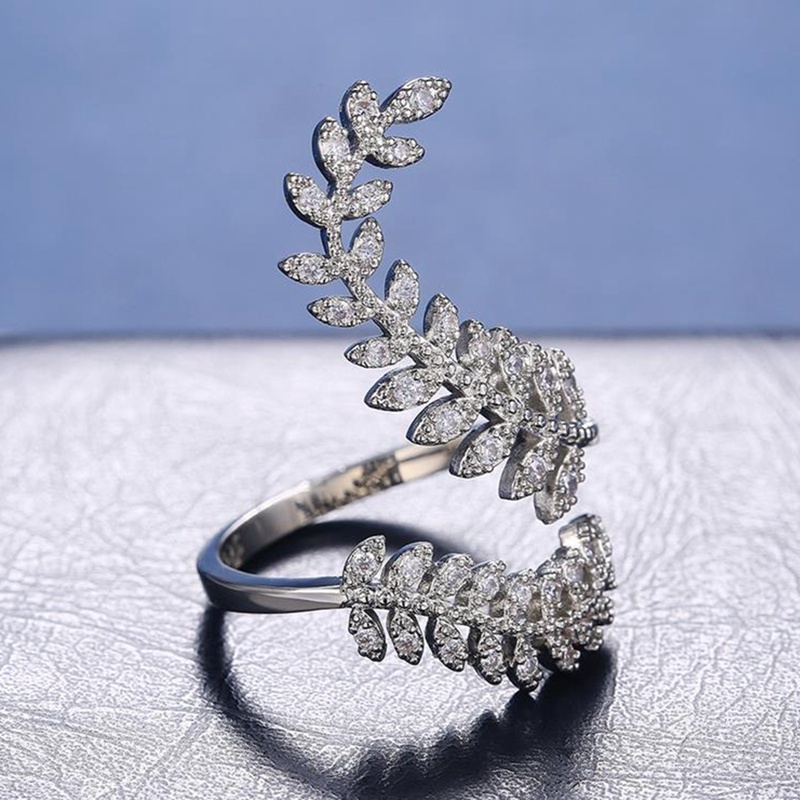 Nhẫn mạ bạc hình chiếc lá dài đính đá zircon sáng tạo thời trang cho nữ