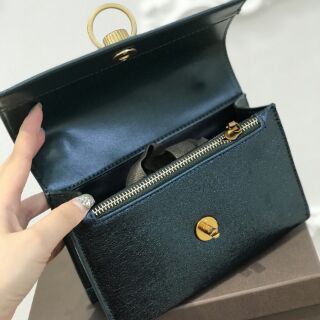 Túi xê nờ ca nhũ