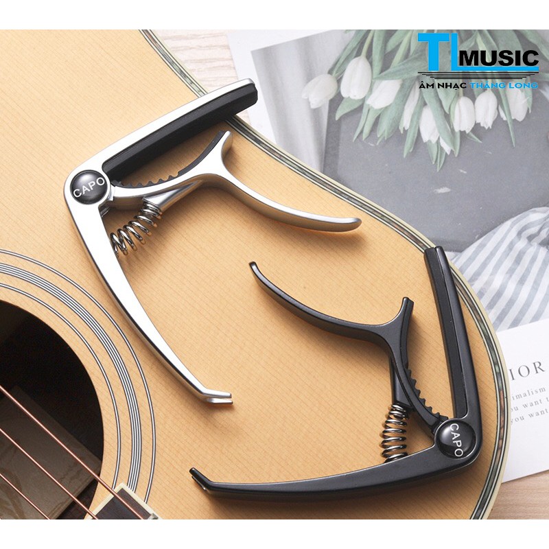 Capo guitar - ukulele JX-05 (Thêm chức năng chốt nhổ dây)