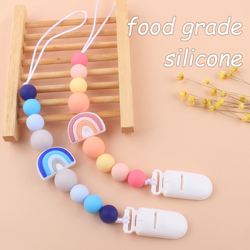 Giá Đỡ Núm Vú Giả Bằng Silicon Màu Cầu Vồng Họa Tiết Hoạt Hình Dễ Thương Cho Bé Sơ Sinh Mọc Răng