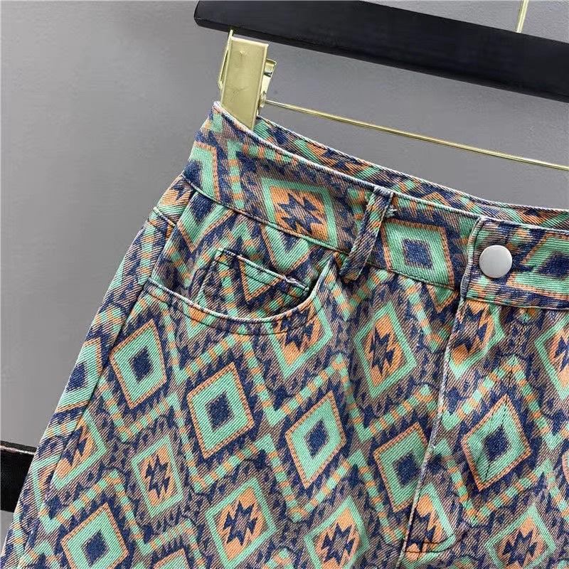 Chân váy jeans chữ A hoạ tiết thổ cẩm QC