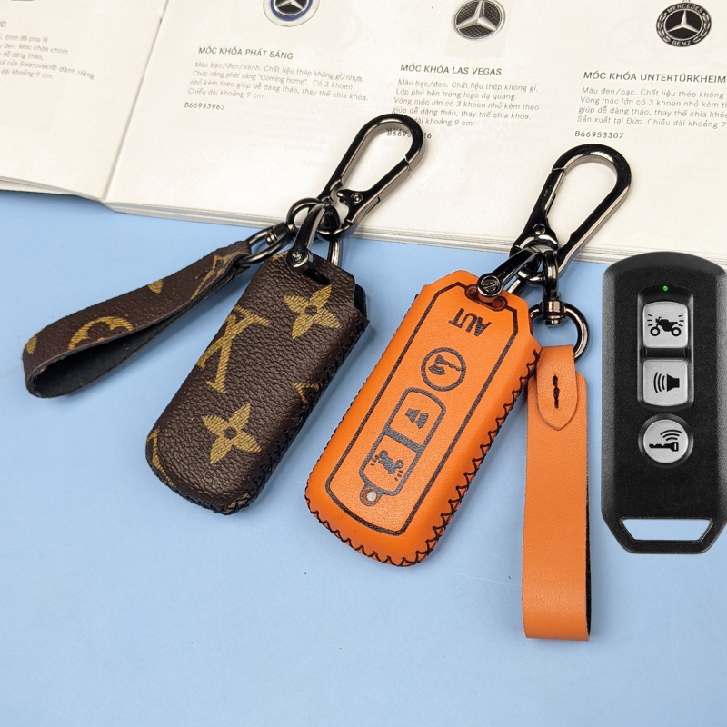 Bọc smartkey honda sh và sh mode PCX che phím bấm loại 3 nút bấm (SHK Móc D)