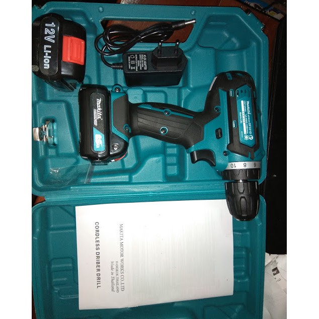 Máy khoan pin 12 vôn DF331D Makita Thái lan-chữ makita đúc nổi- pin to loại chân cài 1.5AH