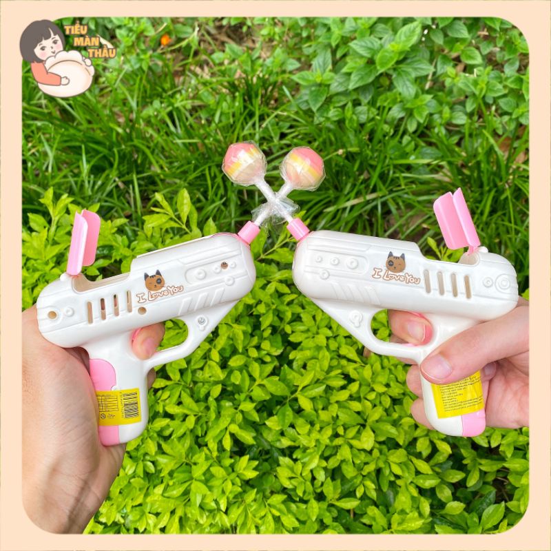 Súng bắn kẹo mút, súng kẹo mút hot tiktok tặng kèm 1 chiếc kẹo mút cho trẻ em | Tiểu Màn Thầu Store
