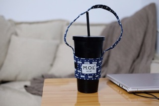 Quai Vải: M.O.L Cup holder